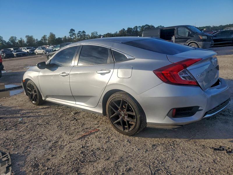 Photo 2 from auction – 2019 HONDA CIVIC LX with VIN 19XFC2F64KE035143