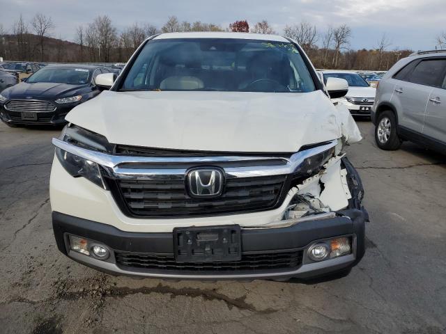 Photo 5 from auction – 2018 HONDA RIDGELINE with VIN 5FPYK3F73JB009790