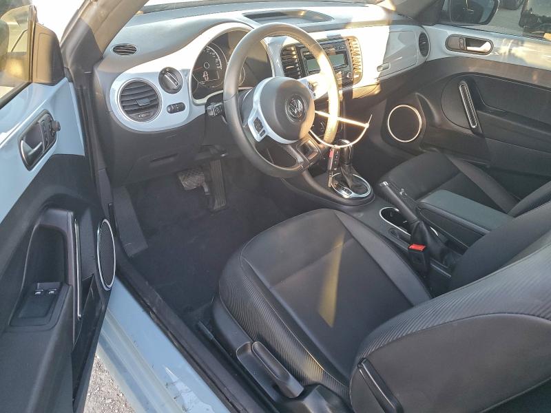 Photo 8 from auction – 2014 VOLKSWAGEN BEETLE with VIN 3VWJP7AT8EM619240