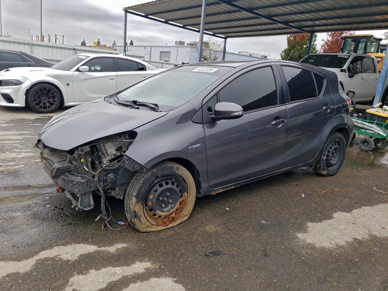 TOYOTA PRIUS C 2014 with VIN JTDKDTB37E1084504 - Photo from auction