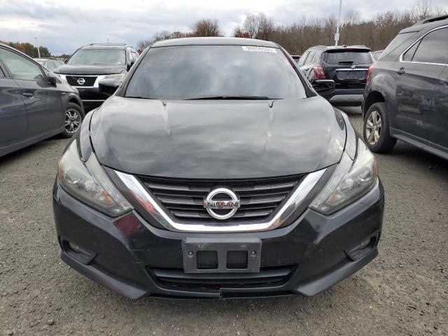 Photo 5 from auction – 2017 NISSAN ALTIMA with VIN 1N4AL3AP2HC167727