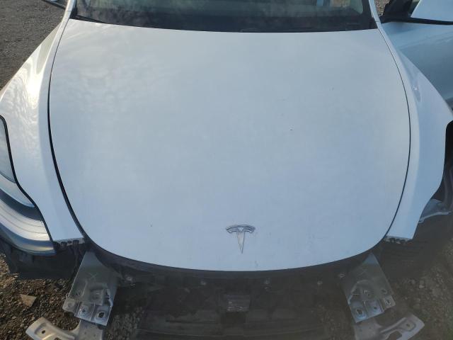 Photo 12 from auction – 2020 TESLA MODEL Y with VIN 5YJYGDEE0LF028476