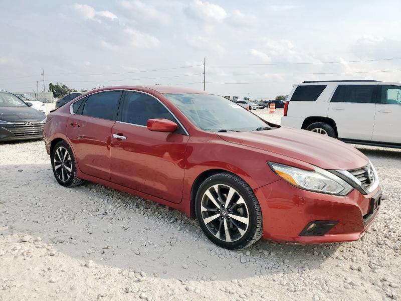 Photo 4 from auction – 2016 NISSAN ALTIMA 2.5 with VIN 1N4AL3AP0GC288304