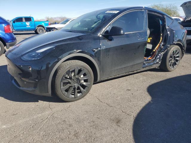TESLA MODEL Y 2023 with VIN 7SAYGDEDXPF969434 - Photo from auction