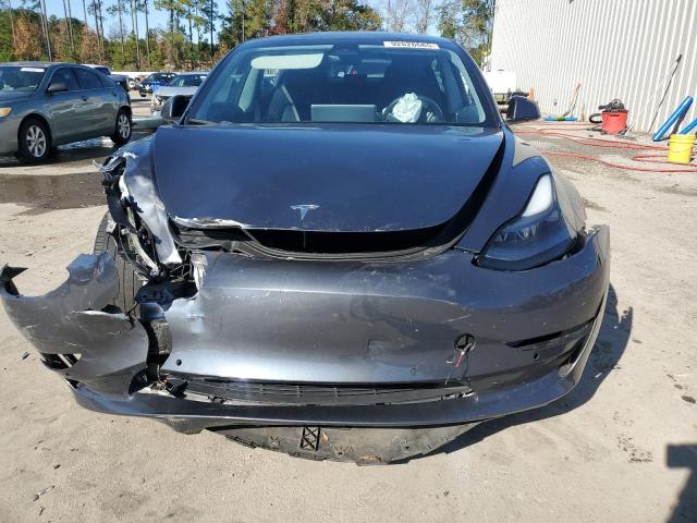 Photo 5 from auction – 2022 TESLA MODEL 3 with VIN 5YJ3E1EB5NF324570