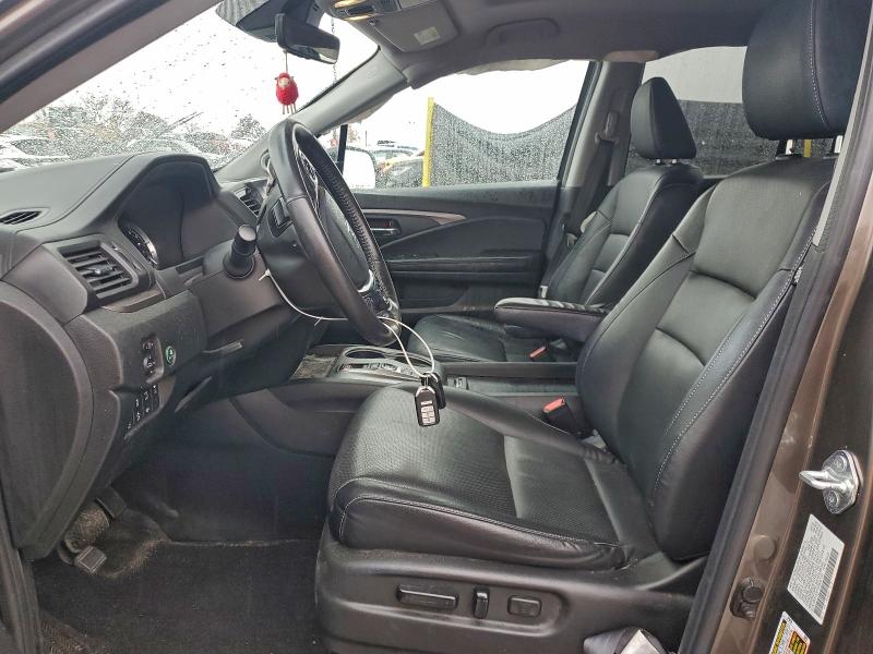 Photo 7 from auction – 2023 HONDA RIDGELINE with VIN 5FPYK3F74PB007135