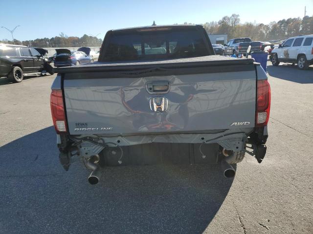 Photo 6 from auction – 2023 HONDA RIDGELINE with VIN 5FPYK3F84PB010805
