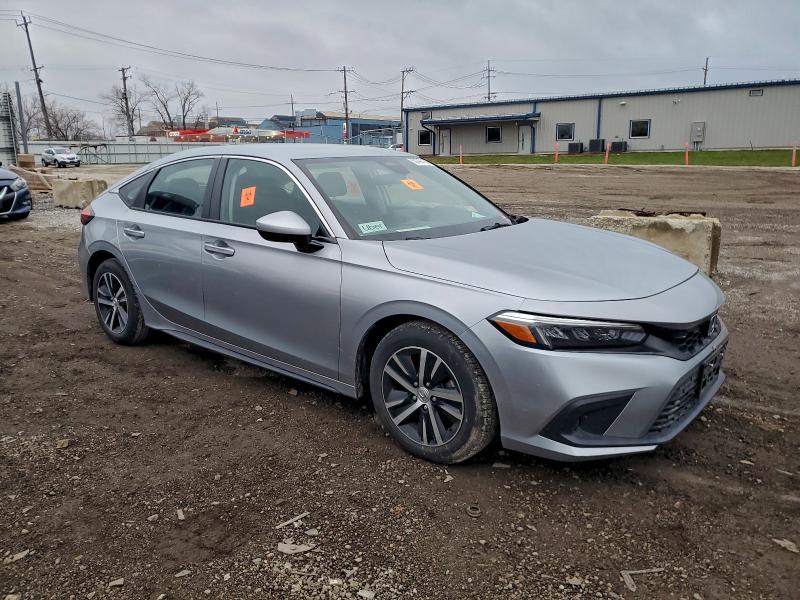 Photo 4 from auction – 2023 HONDA CIVIC LX with VIN 19XFL2H59PE021072