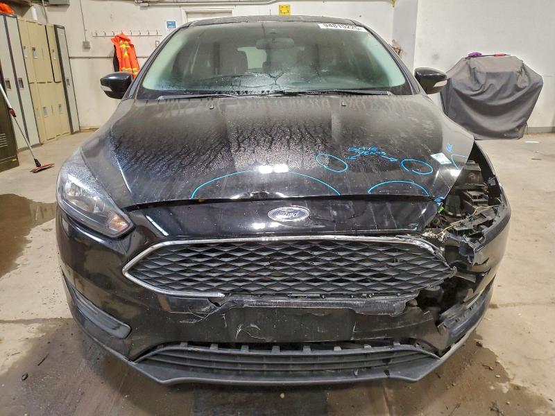 Photo 5 from auction – 2016 FORD FOCUS SE with VIN 1FADP3K21GL380820