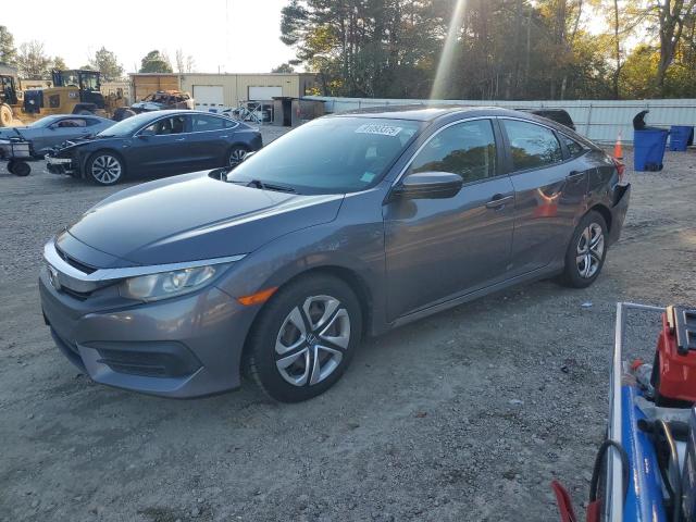 HONDA CIVIC LX 2016 with VIN 2HGFC2F57GH556040 - Photo from auction
