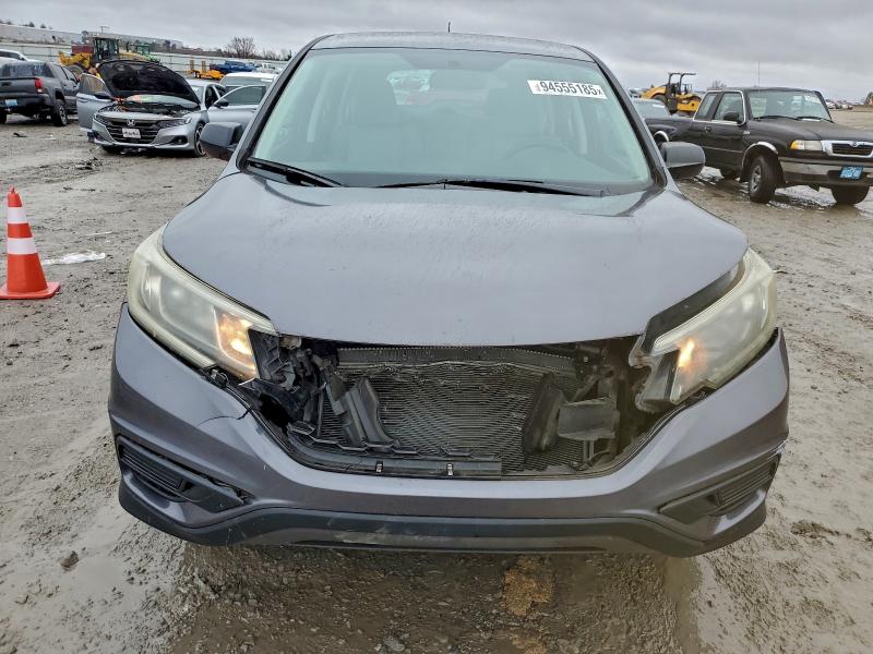 Photo 5 from auction – 2016 HONDA CR-V LX with VIN 2HKRM3H30GH504900
