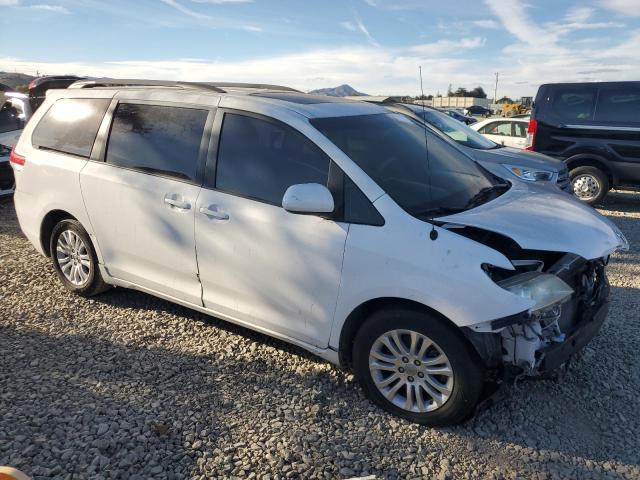 Photo 4 from auction – 2014 TOYOTA SIENNA XLE with VIN 5TDYK3DC6ES460075