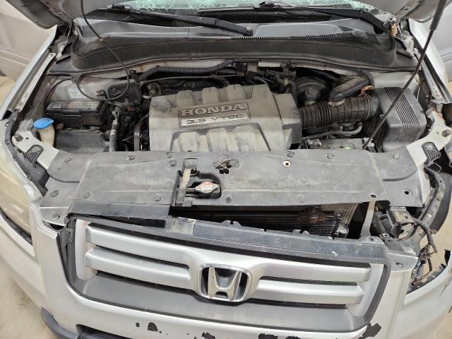 Photo 12 from auction – 2007 HONDA PILOT LX with VIN 2HKYF181X7H504122