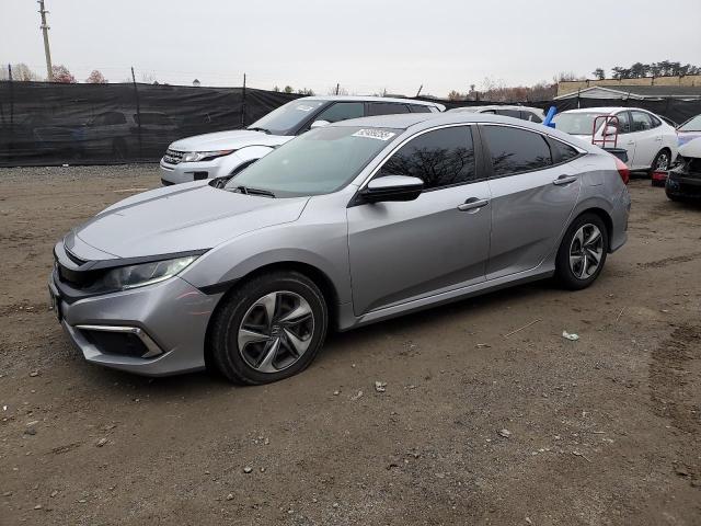 HONDA CIVIC 2019 with VIN 19XFC2F67KE030308 - Photo from auction