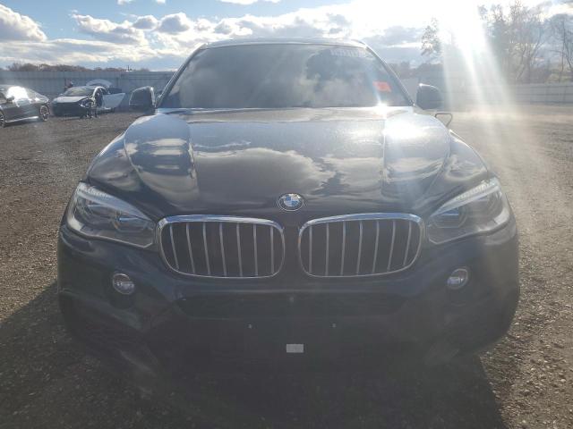 Photo 5 from auction – 2018 BMW X6 with VIN 5UXKU6C5XJ0Z66752