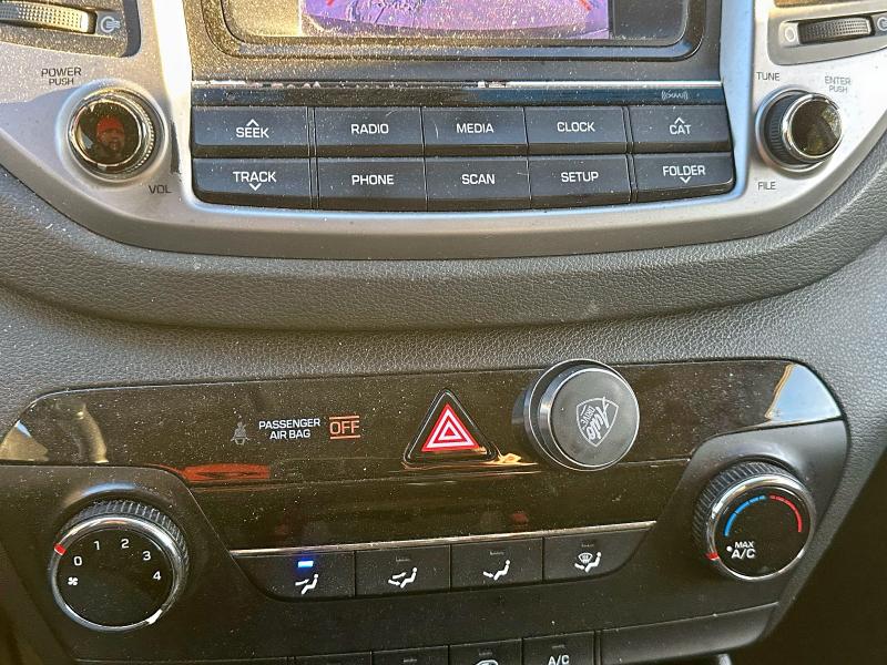 Photo 12 from auction – 2016 HYUNDAI TUCSON SE with VIN KM8J23A44GU164979