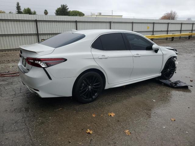 Photo 3 from auction – 2022 TOYOTA CAMRY XSE with VIN 4T1K61AK1NU048342