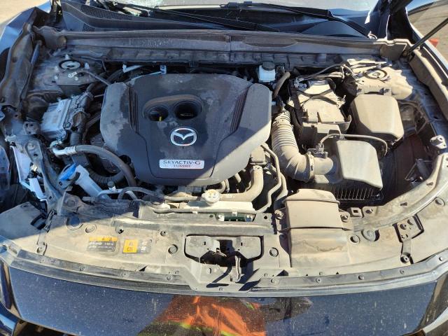Photo 11 from auction – 2023 MAZDA CX-50 PREM with VIN 7MMVABEY8PN115133