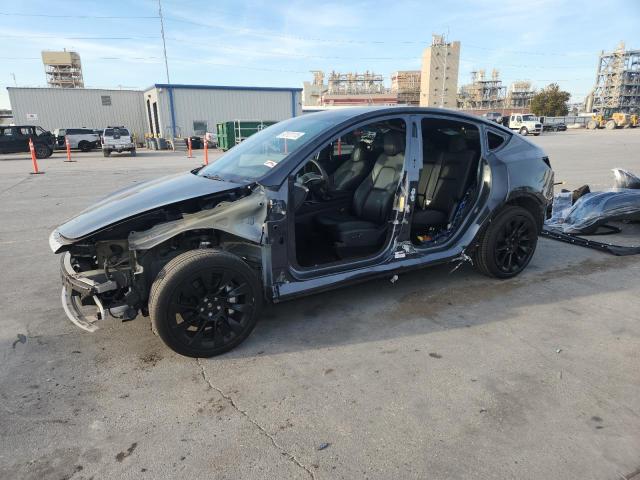 TESLA MODEL Y 2024 with VIN 7SAYGDEE3RF013711 - Photo from auction