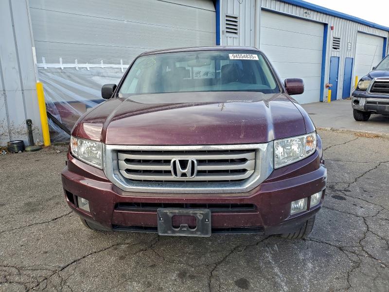 Photo 5 from auction – 2013 HONDA RIDGELINE with VIN 5FPYK1F51DB008127