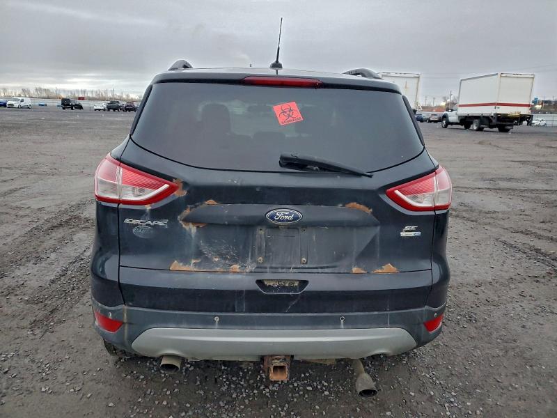 Photo 6 from auction – 2014 FORD ESCAPE SE with VIN 1FMCU9G95EUC12172