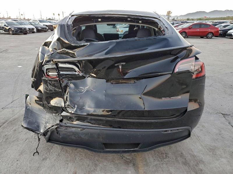 Photo 6 from auction – 2022 TESLA MODEL Y with VIN 7SAYGDEF2NF573559
