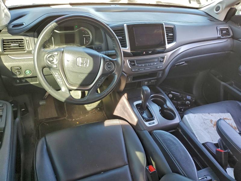 Photo 8 from auction – 2017 HONDA RIDGELINE with VIN 5FPYK2F66HB010458