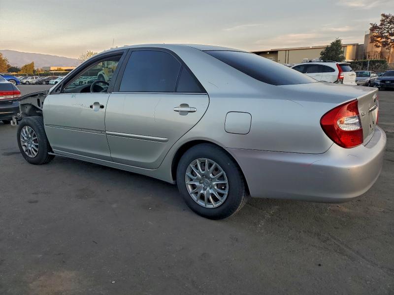 Photo 2 from auction – 2002 TOYOTA CAMRY LE with VIN JTDBE32K420061140