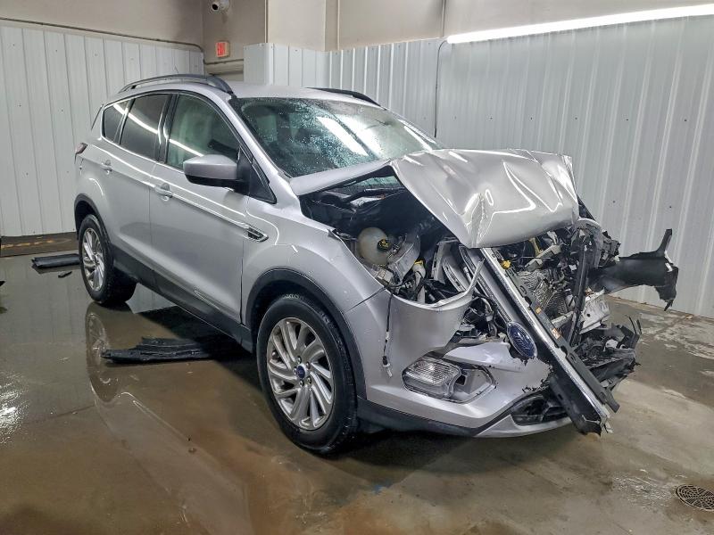 Photo 4 from auction – 2018 FORD ESCAPE SE with VIN 1FMCU0GD9JUA02460