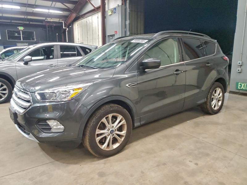 FORD ESCAPE SE 2018 with VIN 1FMCU9GDXJUC83625 - Photo from auction