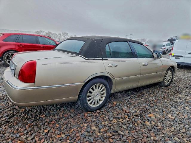 Photo 3 from auction – 2003 LINCOLN TOWN CAR E with VIN 1LNHM81W13Y606384