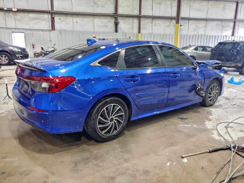 Photo 3 from auction – 2022 HONDA CIVIC LX with VIN 2HGFE2F27NH596261