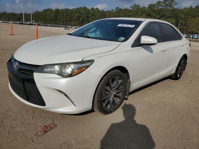 TOYOTA CAMRY LE 2016 with VIN 4T1BF1FK8GU204632 - Photo from auction