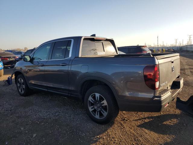 Photo 2 from auction – 2019 HONDA RIDGELINE with VIN 5FPYK3F52KB034356