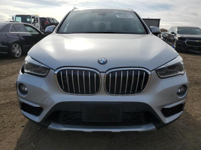 Photo 5 from auction – 2017 BMW X1 XDRIVE2 with VIN WBXHT3C3XH5F76314