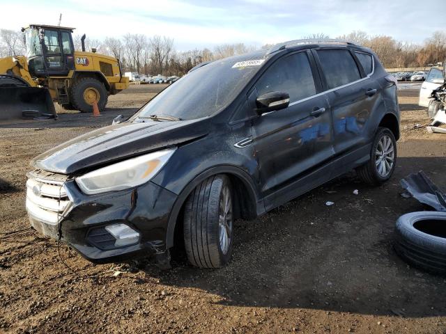 FORD ESCAPE TIT 2017 with VIN 1FMCU9J96HUB55445 - Photo from auction