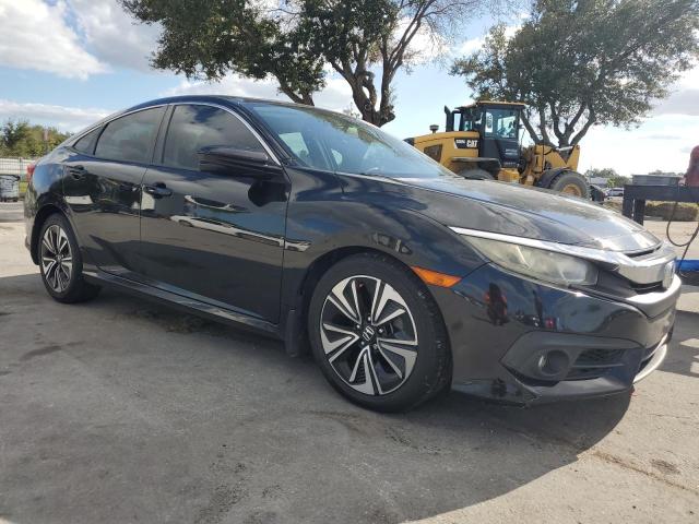 Photo 4 from auction – 2016 HONDA CIVIC EXL with VIN 19XFC1F71GE027169