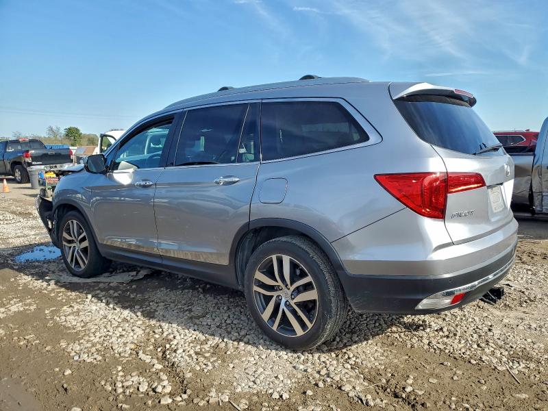 Photo 2 from auction – 2016 HONDA PILOT TOUR with VIN 5FNYF5H95GB045982