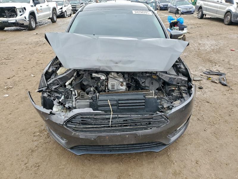 Photo 5 from auction – 2016 FORD FOCUS SE with VIN 1FADP3FE9GL225260