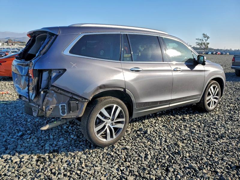 Photo 3 from auction – 2018 HONDA PILOT TOUR with VIN 5FNYF5H98JB009193