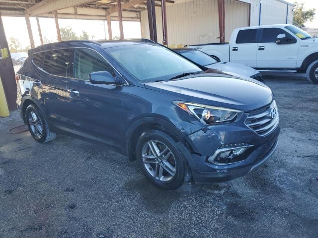 Photo 4 from auction – 2017 HYUNDAI SANTA FE S with VIN 5NMZU3LBXHH037188