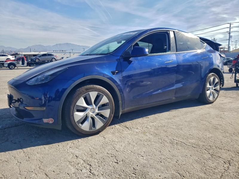 TESLA MODEL Y 2023 with VIN 7SAYGDEE3PA170987 - Photo from auction