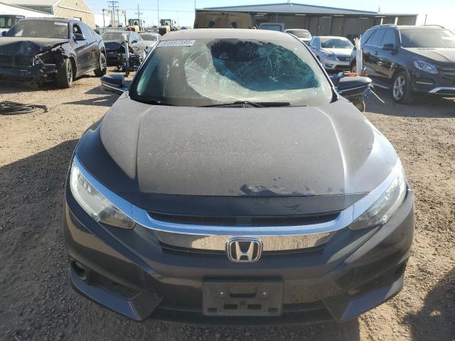 Photo 5 from auction – 2016 HONDA CIVIC TOUR with VIN 19XFC1F92GE034259