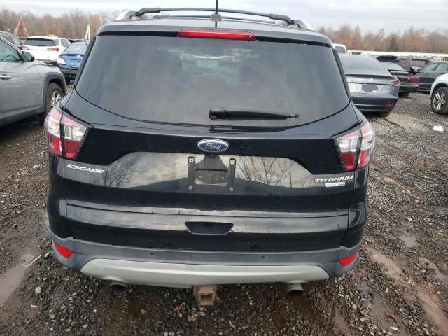 Photo 6 from auction – 2017 FORD ESCAPE TIT with VIN 1FMCU9J99HUC30526
