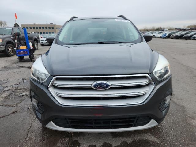 Photo 5 from auction – 2018 FORD ESCAPE SE with VIN 1FMCU0GD1JUA61289