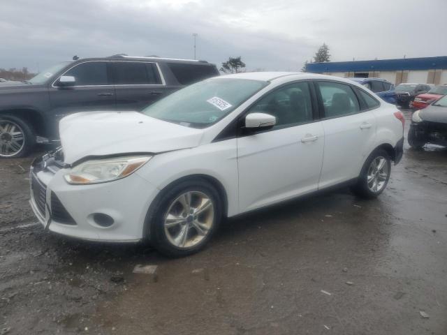 FORD FOCUS SE 2014 with VIN 1FADP3F29EL228565 - Photo from auction