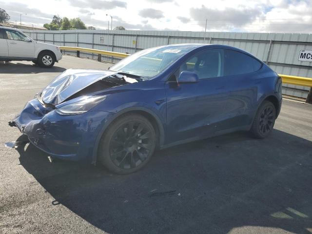 TESLA MODEL Y 2023 with VIN 7SAYGDEE2PF972238 - Photo from auction