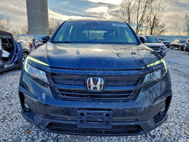 Photo 5 from auction – 2022 HONDA PILOT SE with VIN 5FNYF6H2XNB054277