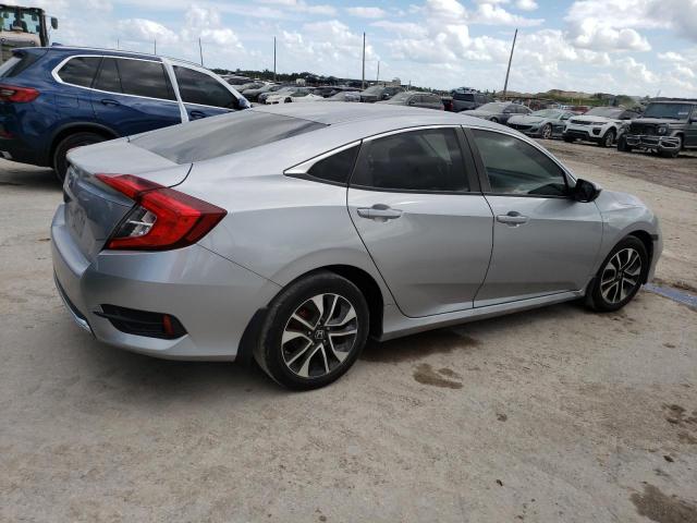 Photo 3 from auction – 2021 HONDA CIVIC LX with VIN 2HGFC2F60MH515348