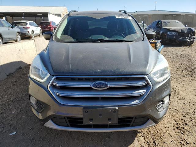 Photo 5 from auction – 2017 FORD ESCAPE SE with VIN 1FMCU9GDXHUE82944